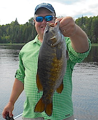 GIANT Trophy Smallmouth Bass Fishing at Fireside Lodge by Rick